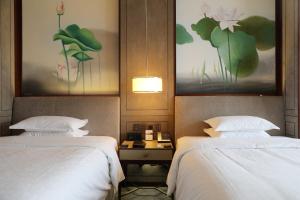 Katil atau katil-katil dalam bilik di Sheraton Shanghai Jiading Hotel