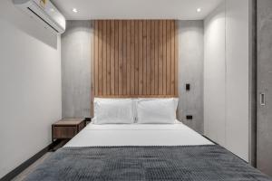 Postel nebo postele na pokoji v ubytování Apartamentos HOUSY Laureles