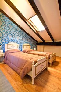 Postel nebo postele na pokoji v ubytování B&B Casa Arcangeli