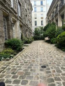 Paris exclusif quartier latin avec jardin, charme fou !