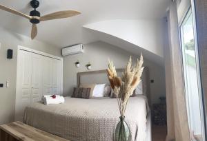 Letto o letti in una camera di Escale Caraïbes