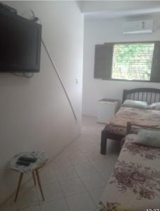 Televízia a/alebo spoločenská miestnosť v ubytovaní POUSADA BRASIL RECIFE