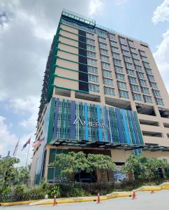 a tall building with the akhtar hotel on it at Amerin Hotel Johor Bahru in Johor Bahru