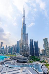 a view of the taipei skyscraper at EMAAR Residences Fashion Avenue - former Address Dubai Mall Residences by Qstay- Full Burj Khalfa Fountain view in Dubai