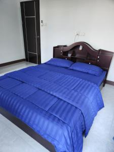 Postel nebo postele na pokoji v ubytování Baan Fah Chiang Rai