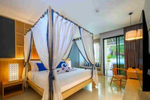 Postel nebo postele na pokoji v ubytování CRAFT Resort & Villas, Phuket Town