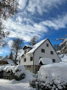 Apartmány u vleku - Podkrovní apartmán v zime