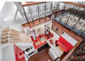 an overhead view of a living room with a balcony at Tranquil Kolivata lefkada Retreat House in Alexandros