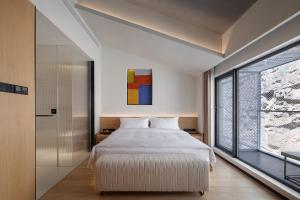Fotografia z galérie ubytovania Tingjian Twenty-three Bay Rock Wall Private Soup Designer Homestay v destinácii Yixing