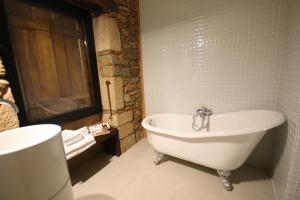 Ванная комната в Casa de Baixo - Nature Hotel