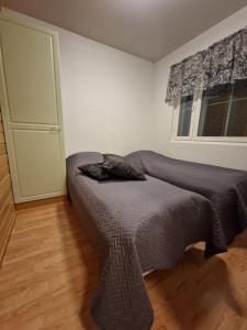 Ένα ή περισσότερα κρεβάτια σε δωμάτιο στο Levi - Sky Slope Apartment - 3 Bedrooms - Ski-in - Ski-out