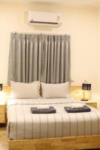 Postel nebo postele na pokoji v ubytování Shanti Boutique Hotel