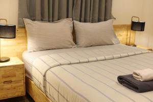 Postel nebo postele na pokoji v ubytování Shanti Boutique Hotel