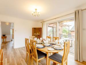 a dining room with a table and chairs at 3 bed in Ross-on-Wye 89313 in Peterstow