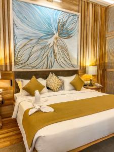 Postelja oz. postelje v sobi nastanitve Hotel Sigiriya