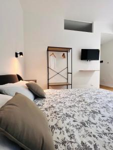 Postel nebo postele na pokoji v ubytování Finella Charming Rooms