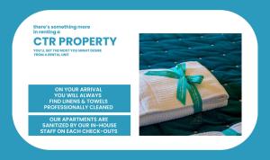 un volantino con un asciugamano con un fiocco blu di Recanissu Apartment with balcony & AC a Vernazza