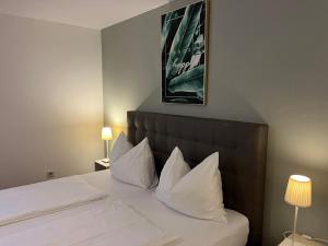 Postel nebo postele na pokoji v ubytování Hotel Pension Waldesruh