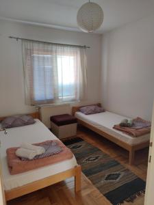 Voodi või voodid majutusasutuse Poseidon Apartment toas