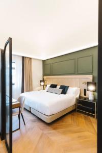 Кровать или кровати в номере Palacio Arriluce Hotel - The Leading Hotels of the World