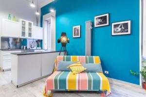 מיטה או מיטות בחדר ב--Premium Suite- Loft Artistico nel centro di Torino