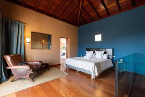 Ένα ή περισσότερα κρεβάτια σε δωμάτιο στο Villa Atlanntes con piscina en Fuerteventura +42 φωτογραφίες