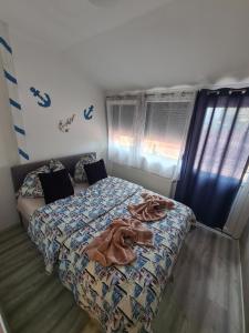 Posteľ alebo postele v izbe v ubytovaní Tom Apartmans