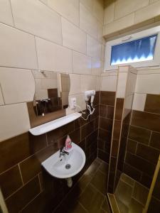 Kúpeľňa v ubytovaní Tom Apartmans