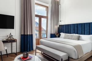 Кровать или кровати в номере Palacio Arriluce Hotel - The Leading Hotels of the World