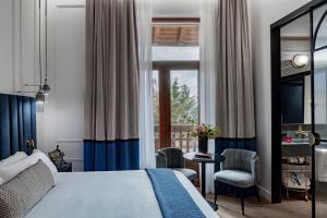 Кровать или кровати в номере Palacio Arriluce Hotel - The Leading Hotels of the World