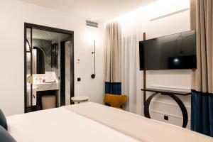 Кровать или кровати в номере Palacio Arriluce Hotel - The Leading Hotels of the World