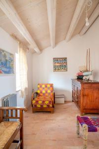 A seating area at A26 - Poggio, cielo-terra con vista mare mozzafiato
