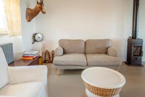 A seating area at A26 - Poggio, cielo-terra con vista mare mozzafiato
