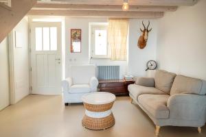 A seating area at A26 - Poggio, cielo-terra con vista mare mozzafiato