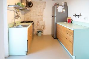 A kitchen or kitchenette at A26 - Poggio, cielo-terra con vista mare mozzafiato