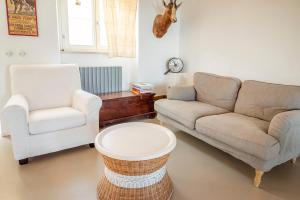 A seating area at A26 - Poggio, cielo-terra con vista mare mozzafiato