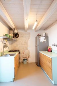 A kitchen or kitchenette at A26 - Poggio, cielo-terra con vista mare mozzafiato