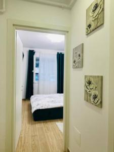 Postel nebo postele na pokoji v ubytování CozyApartment14
