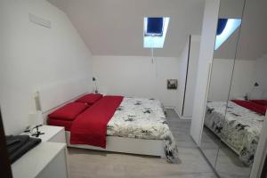 Ліжко або ліжка в номері ClaRo Appartamento intero