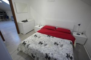 Ліжко або ліжка в номері ClaRo Appartamento intero
