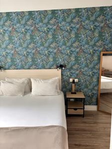 Postel nebo postele na pokoji v ubytování Mosaikhotel