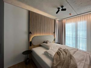 Кровать или кровати в номере B5 Apartments