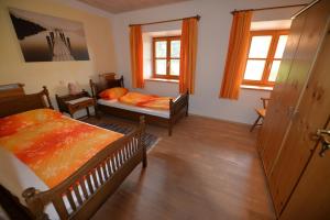 Ένα ή περισσότερα κρεβάτια σε δωμάτιο στο Ferienwohnung Kurz