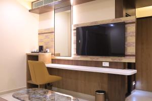TV a/nebo společenská místnost v ubytování Kings Bury Inn