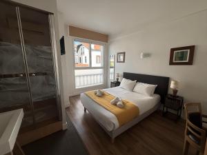 Postel nebo postele na pokoji v ubytování Mosaikhotel
