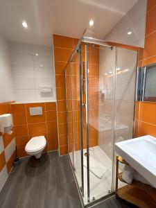 Koupelna v ubytování Mosaikhotel