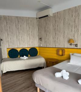 Postel nebo postele na pokoji v ubytování Mosaikhotel