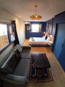 Posteľ alebo postele v izbe v ubytovaní Playa Del Sol Surf House + 37 fotografií