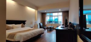 Katil atau katil-katil dalam bilik di HOTEL RENDEZVOUS +68 gambar