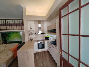 Køkken eller tekøkken på Hermes Apartament